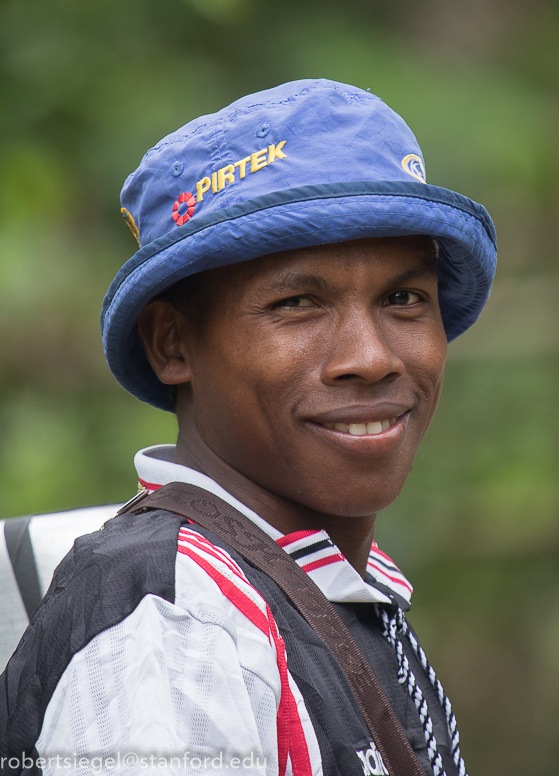 man  with blue hat